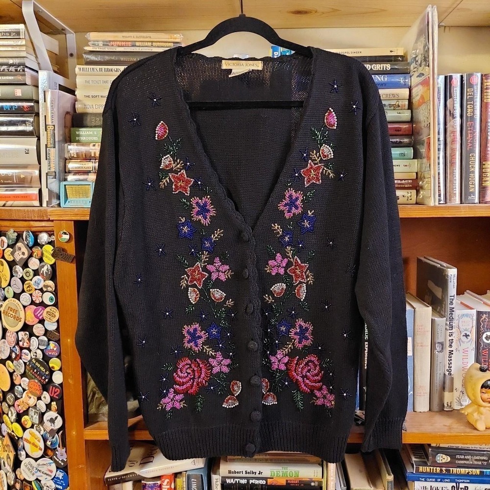 Vintage black beaded cardigan with scalloped neckline.